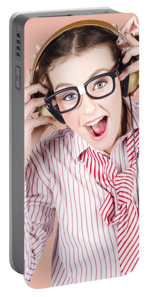 Music Portable Battery Charger featuring the photograph Nerdy Retro Schoolgirl Raving To Music On White by Jorgo Photography