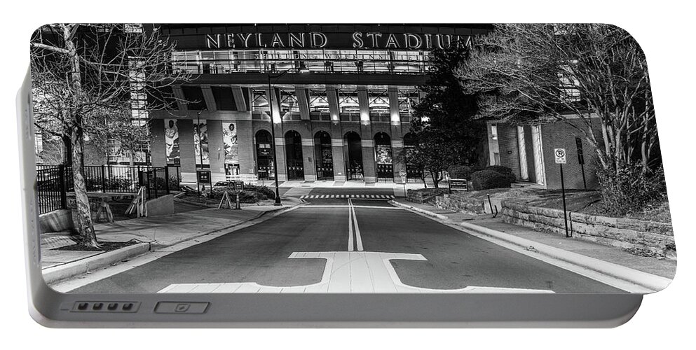 University Of Tennessee At Night Portable Battery Charger featuring the photograph Neyland Stadium at the University of Tennessee at night in black and white by Eldon McGraw