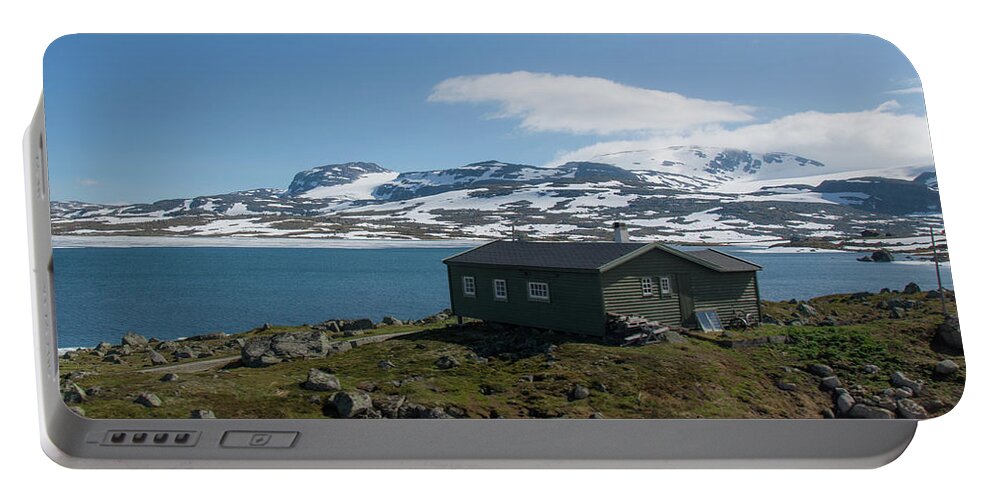 Norway Portable Battery Charger featuring the photograph Norwegian House on Mountaintop Lake by Matthew DeGrushe