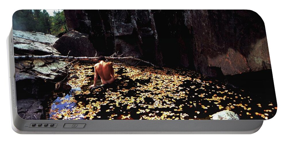 Leaves Portable Battery Charger featuring the photograph Nude in a Pool of Leaves by Wayne King