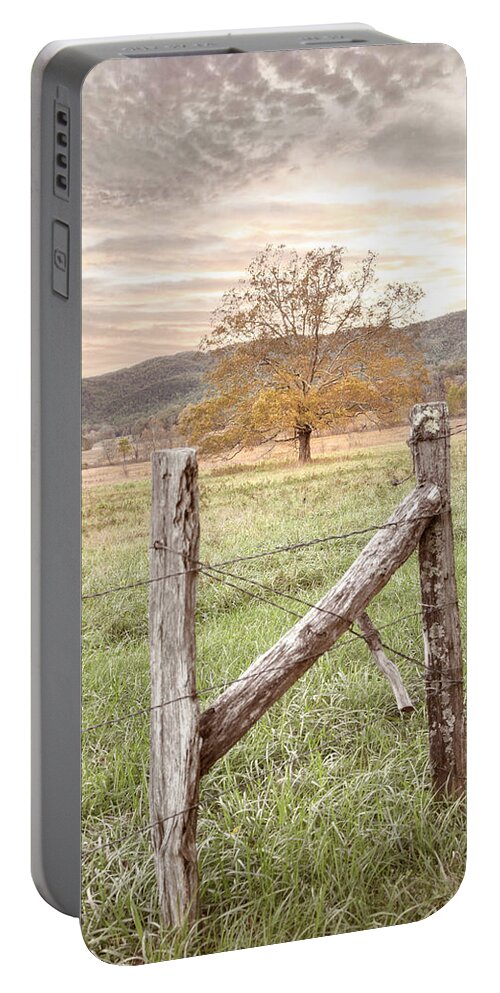Cades Portable Battery Charger featuring the photograph Oak Tree in the Mist at Sunrise by Debra and Dave Vanderlaan