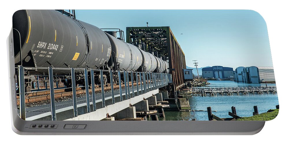 Oil Train Over Swinomish Channel Portable Battery Charger featuring the photograph Oil Train over Swinomish Channel by Tom Cochran