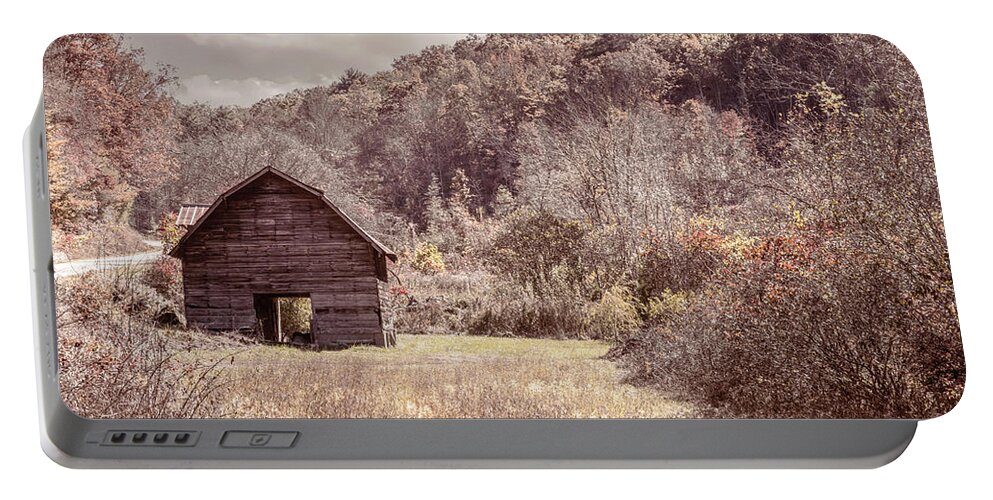 Barns Portable Battery Charger featuring the photograph Old Barn along the Countryside Roads by Debra and Dave Vanderlaan