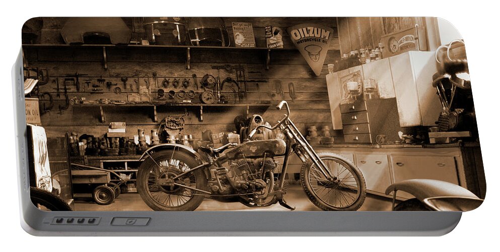 Motorcycle Portable Battery Charger featuring the photograph Old Motorcycle Shop by Mike McGlothlen