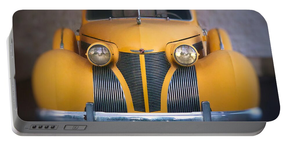 Classic Cars Portable Battery Charger featuring the photograph Old Yellow Cadillac by Nathan Little
