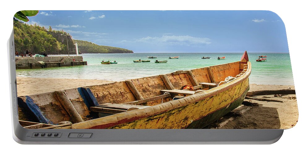 Dugout Portable Battery Charger featuring the photograph On the Beach at L'Anse la Raye by Andrew Wilson