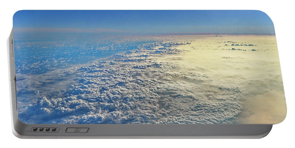 Above The Clouds Portable Battery Charger featuring the photograph Our Beautiful Blue World by Heidi Fickinger