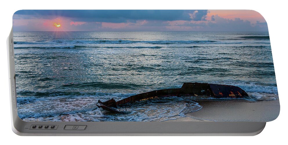 Beach Portable Battery Charger featuring the photograph Outer Banks Shipwreck Returns to Sea 81 by Dan Carmichael