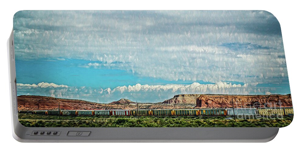 Ssouthwest Portable Battery Charger featuring the photograph Panoramic of Train on tracks in southwestern United States with by Susan Vineyard