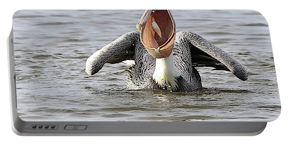 Pelicans Portable Battery Charger featuring the photograph Pelican Showing off Its Catch in its Throat Pouch by Mingming Jiang