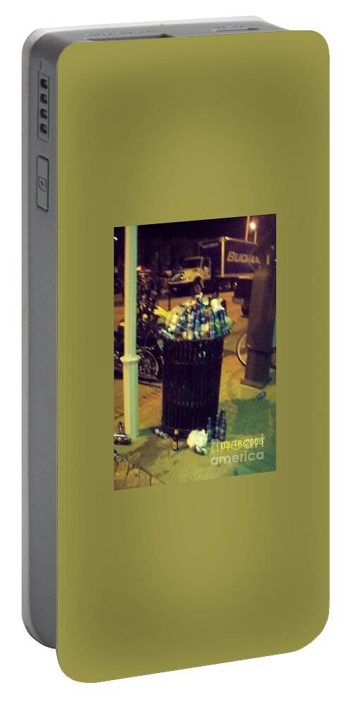 Trash Portable Battery Charger featuring the photograph People do try by Nancy Graham