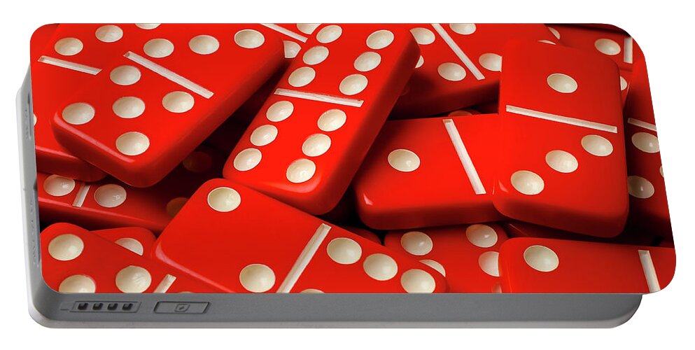 Pile Portable Battery Charger featuring the photograph Red Dominos by Garry Gay