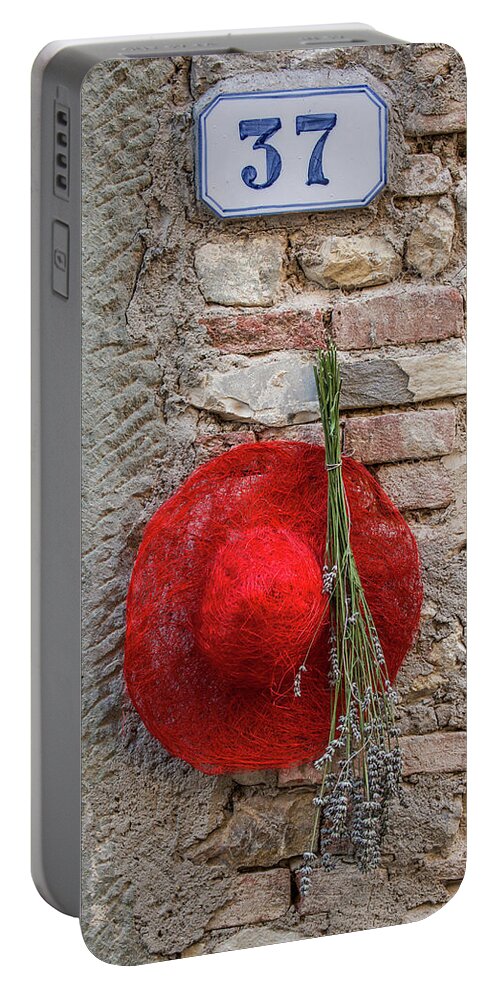 Red Hat Portable Battery Charger featuring the photograph Red Hat of Tuscany by David Letts