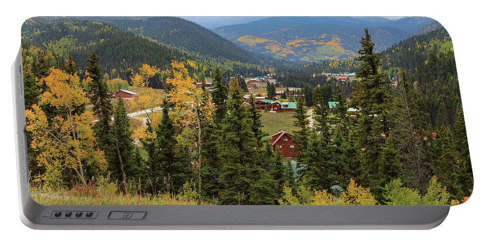 Foliage Portable Battery Charger featuring the photograph Red River Cabins by Steve Templeton