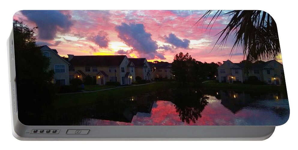 Sunrise Portable Battery Charger featuring the photograph Red Sunrise Reflection Fort Myers FL by Claudia Zahnd-Prezioso
