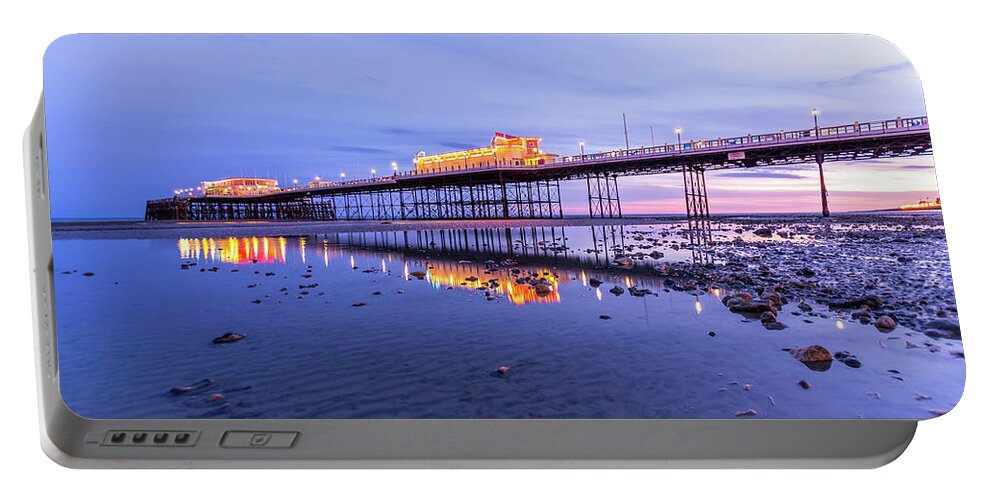 Beach Portable Battery Charger featuring the photograph Reflection of the pier at sunset by Andrew Lalchan