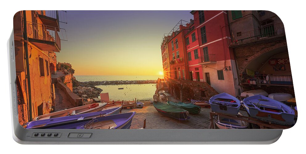 Riomaggiore Portable Battery Charger featuring the photograph Riomaggiore, boats in the street at sunset. Cinque Terre by Stefano Orazzini
