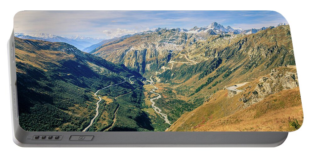 Alps Portable Battery Charger featuring the photograph Road in the Alps by Alexey Stiop