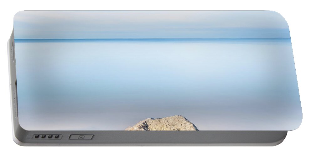 Background Portable Battery Charger featuring the photograph The Lone Rock by Stefano Orazzini