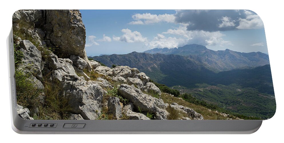 Mountains Portable Battery Charger featuring the photograph Rocks and clouds by Adriana Mueller