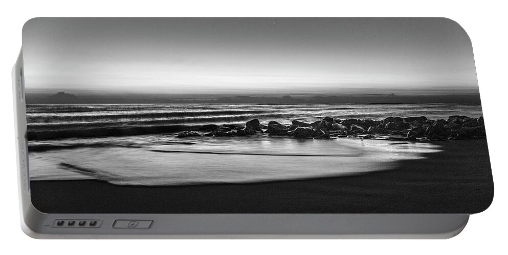 Birds Portable Battery Charger featuring the photograph Rocky Beach at Dawn Black and White by Debra and Dave Vanderlaan
