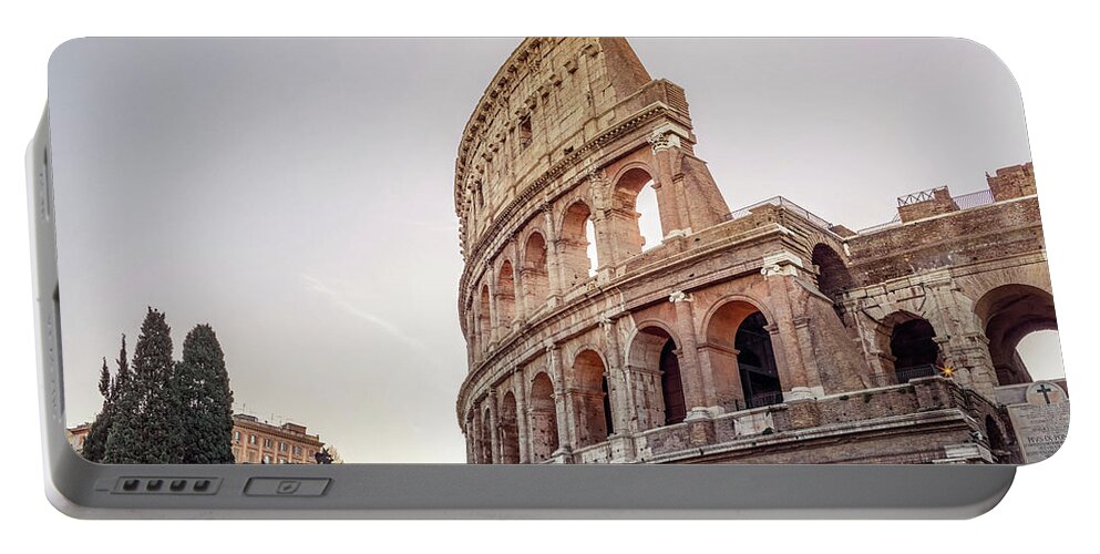 Capital Portable Battery Charger featuring the photograph Rome and The Coliseum at sunrise by Benoit Bruchez