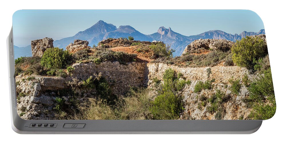 Fortress Portable Battery Charger featuring the photograph Ruins of an ancient fortress in the mountains by Adriana Mueller
