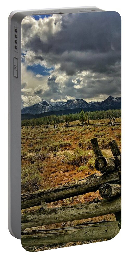 Sawtooth Mountains Portable Battery Charger featuring the photograph Sawtooth Storm Clouds by Jerry Abbott