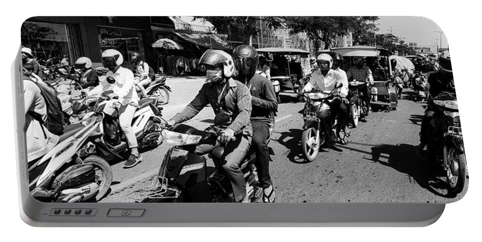 Asia Portable Battery Charger featuring the photograph Siem Reap cambodia street motorbikes black and whiite by Sonny Ryse