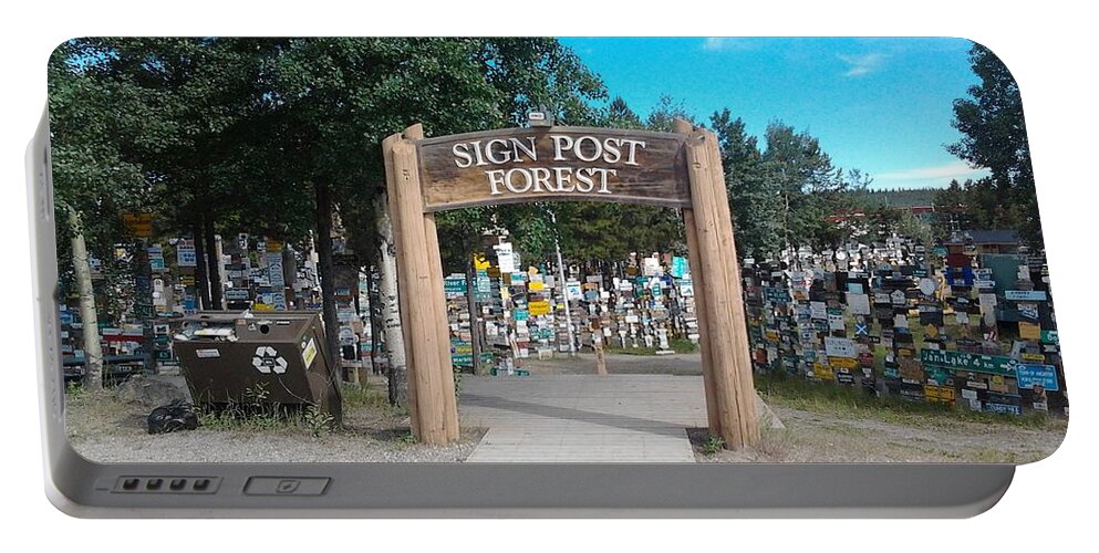 Signs Portable Battery Charger featuring the photograph Sign Post Forest Yukon, Canada by James Cousineau