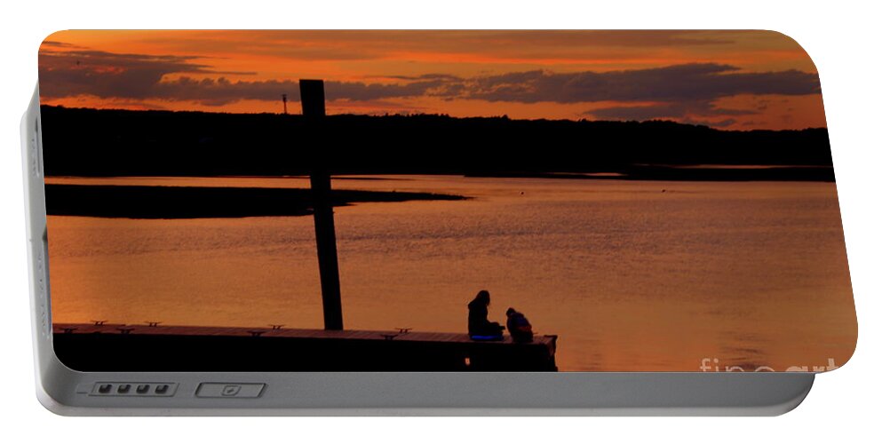 Sunset Portable Battery Charger featuring the photograph Sitting on the Dock at sunset by Lennie Malvone