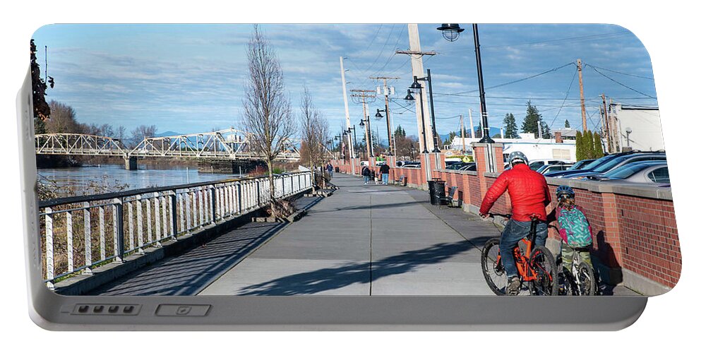 Skagit Riverwalk And Two Cyclists Portable Battery Charger featuring the photograph Skagit Riverwalk and Two Cyclists by Tom Cochran