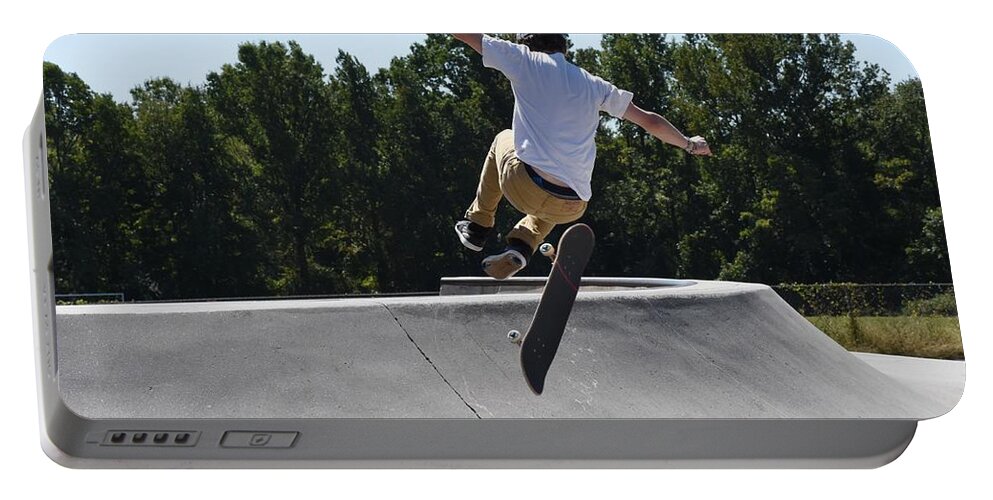 Skateboard Portable Battery Charger featuring the photograph Skateboarding 69 by Joyce StJames