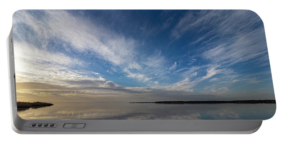 Reflection Portable Battery Charger featuring the photograph Sky Meets Water by Jerry Connally