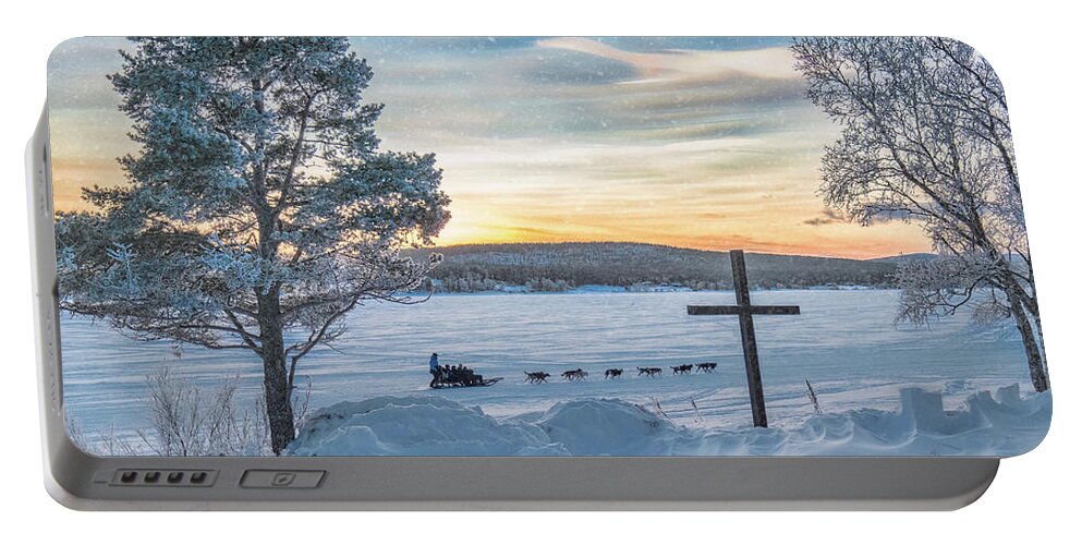 Snow Portable Battery Charger featuring the photograph Snow Scene in Jukkasjarvi, Sweden by Roberta Kayne