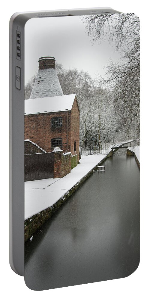 Kiln Portable Battery Charger featuring the photograph Snowy canal by Average Images