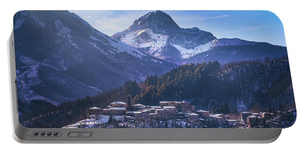 Garfagnana Portable Battery Charger featuring the photograph Snowy village in Alpi Apuane by Stefano Orazzini