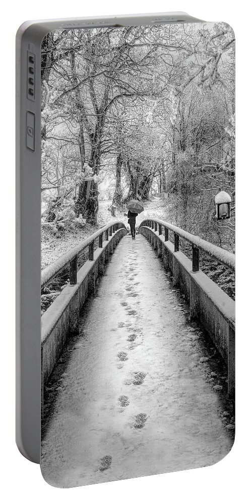 Bridge Portable Battery Charger featuring the photograph Snowy Walk in Black and White by Debra and Dave Vanderlaan