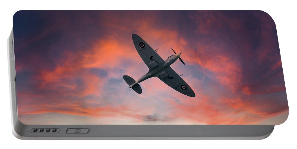 Eastbourne International Airshow Portable Battery Charger featuring the photograph Spitfire flying at sunset by Andrew Lalchan