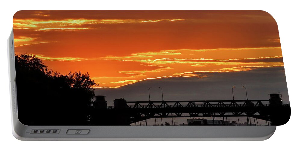Sunset Portable Battery Charger featuring the photograph Split Frame by Linda Stern