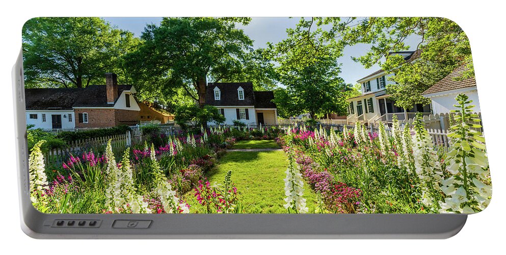 Colonial Williamsburg Portable Battery Charger featuring the photograph Spring Flowers in May at the Taliaferro-Cole Garden by Rachel Morrison