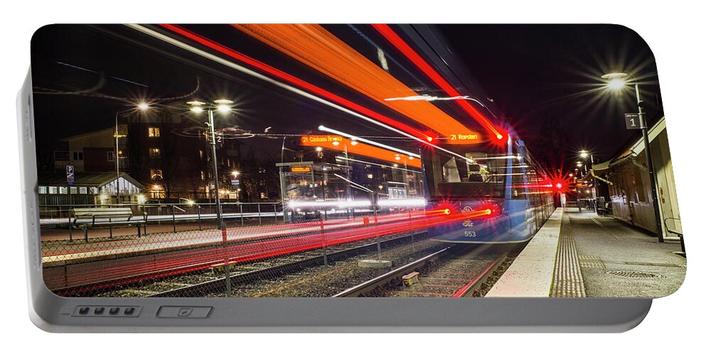Brevik Portable Battery Charger featuring the photograph Stockholm tram by Alexander Farnsworth