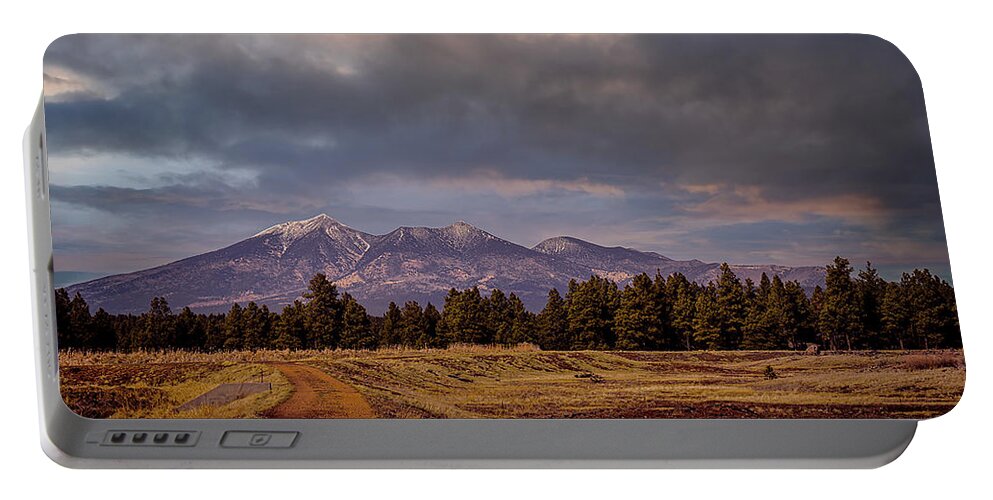 Wetlands Portable Battery Charger featuring the photograph Stormy Skies by Laura Putman