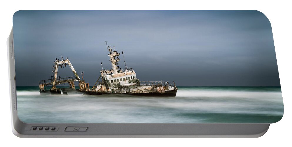 Zeila Shipwreck Portable Battery Charger featuring the photograph Stuck by Peter Boehringer