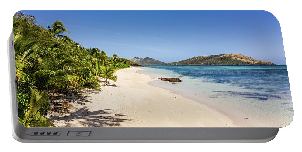 Fiji Portable Battery Charger featuring the photograph Stunning white sand beach by the blue lagoon in the Yasawa islan by Didier Marti