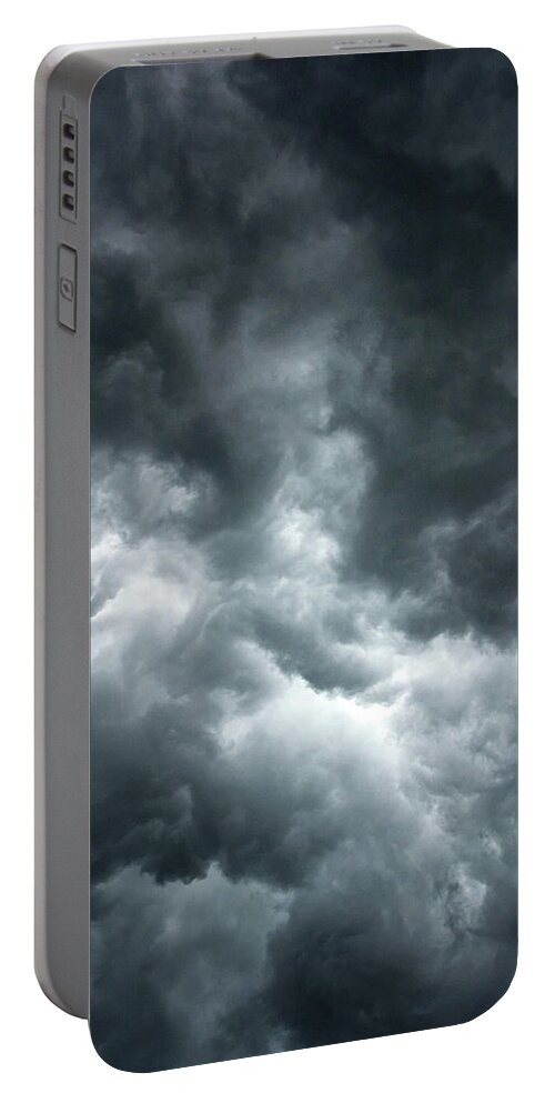 Clouds Portable Battery Charger featuring the photograph Stormy clouds in the sky. by Bernhard Schaffer