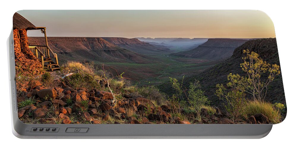 Klip River Valley Portable Battery Charger featuring the photograph Sun Setting at Grootberg Lodge over Klip River Valley in Namibia by Belinda Greb