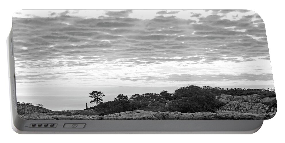 Rockport Portable Battery Charger featuring the photograph Sunbeams coming down on Thacher Lighthouse and Long Beach Rockport Massachusetts Black and White by Toby McGuire