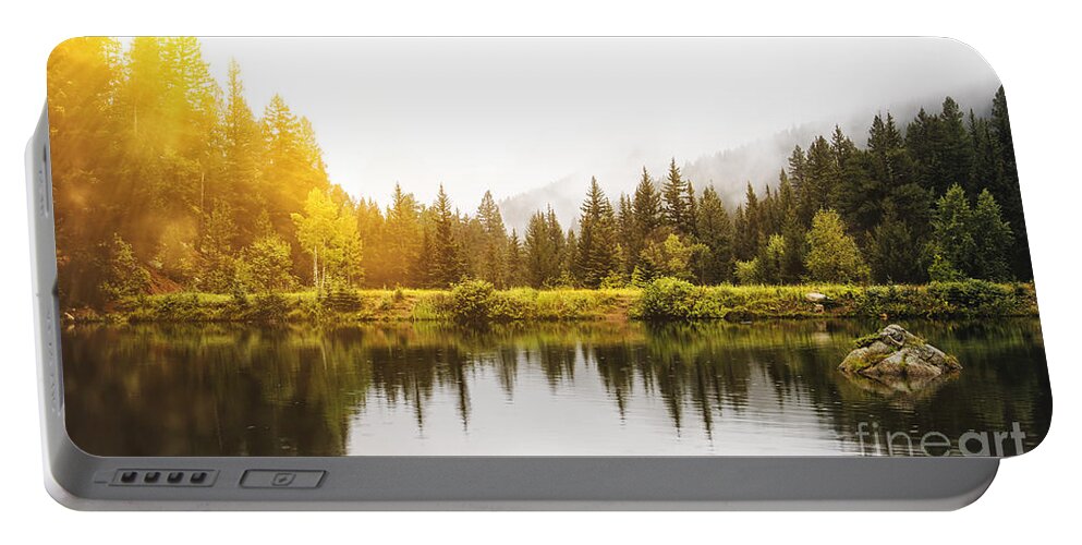 Colorado Portable Battery Charger featuring the photograph Sunlight and Fog Before the Storm by Lincoln Rogers