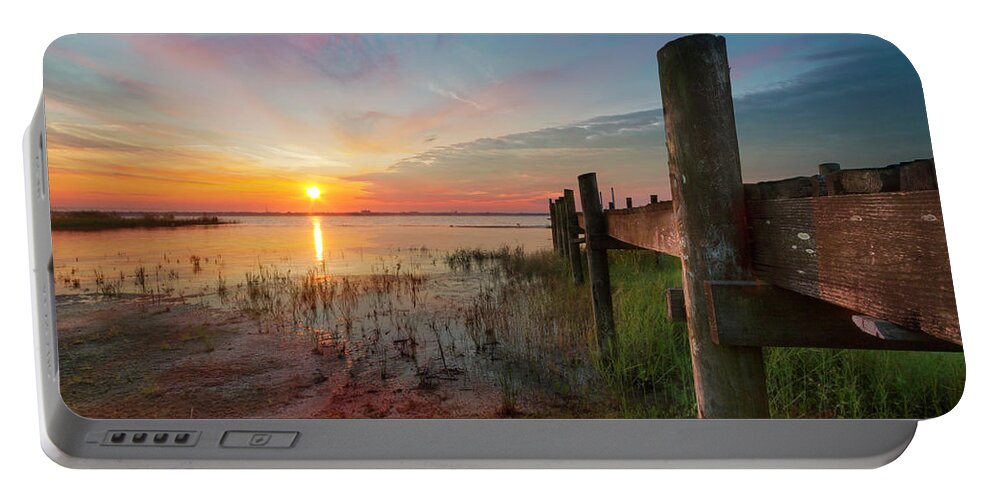 Clouds Portable Battery Charger featuring the photograph Sunrise Over the Lake by Debra and Dave Vanderlaan